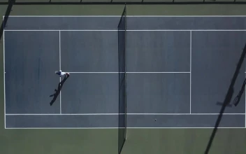 Stock Footage Two People Playing Tennis Aerial View