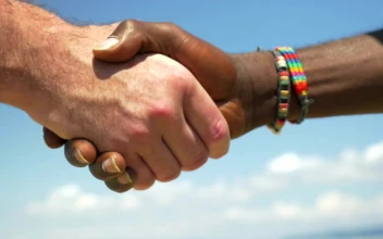 Stock Footage Two Men Shake Hands Outside