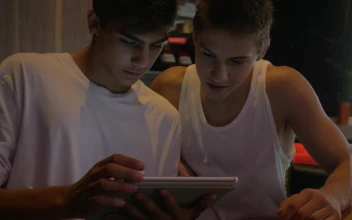 Stock Footage Two Friends Browsing Social Media