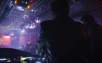 Stock Footage Two Djs Mixing Music At A Nightclub
