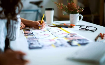 Stock Footage Two Creative Women Drawing Plan On Desk In Modern Studio