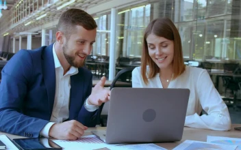 Stock Footage Two Coworkers Talking And Laughing