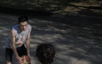 Stock Footage Two Boys Playing Basketball One On One