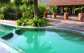 Stock Footage Turquoise Swimming Pool In The Hotel Patio