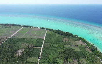 Stock Footage Tropical Island Near A Coral Atoll Reef