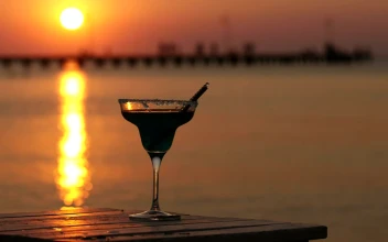 Stock Footage Tropical Cocktail Glass At Sunset