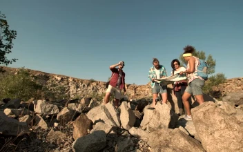 Stock Footage Travellers Checking The Map In The Wilderness