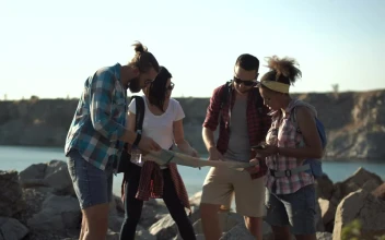 Stock Footage Travelers Watching The Map In The Countryside