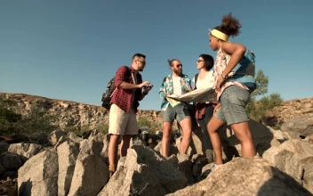 Stock Footage Travelers Looking At Map In The Countryside