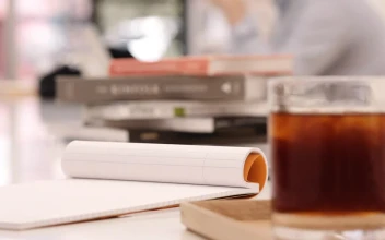 Stock Footage Writing On A Notebook At A Coffee Shop Free