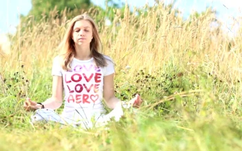 Stock Footage Young Woman Meditating In A Field Free
