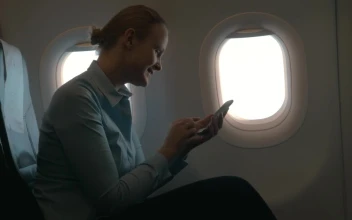 Stock Footage Woman Using Her Phone During A Flight Free