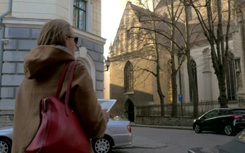Stock Footage Woman Taking Photos In An Old Part Of Town Free