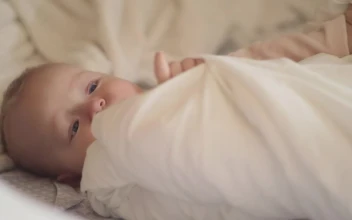 Stock Footage Young Baby Moving Their Bedding Free