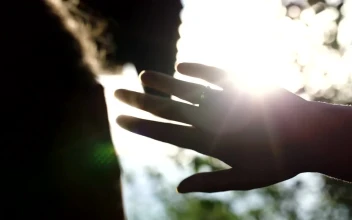 Stock Footage Woman Holding Up Her Hand To Block The Sun Free