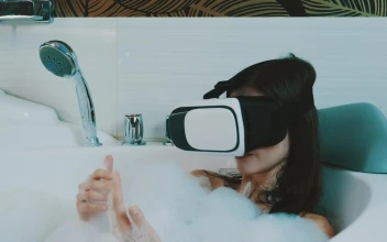 Stock Footage Woman Taking A Bath With A Vr Headset Free