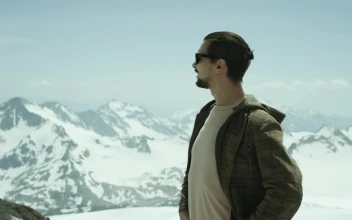 Stock Footage Young Man Standing On A Snow Covered Hill Free