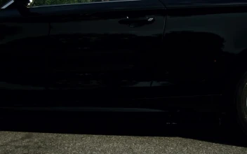 Stock Footage Woman Getting Out Of A Black Car Free