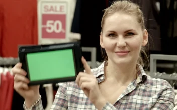 Stock Footage Woman With Green Screen Tablet In Clothing Store Free