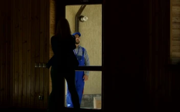 Stock Footage Women Receiving A Package From The Delivery Guy Free