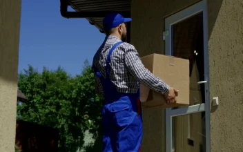 Stock Footage Woman Receiving A Package At Home Free