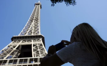 Stock Footage Woman Taking A Photo Of The Eiffel Tower Free