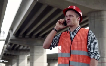 Stock Footage Young Construction Worker Talking On The Phone Free