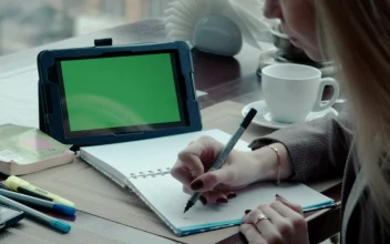 Stock Footage Writing A Note On A Notebook And Using Tablet Free