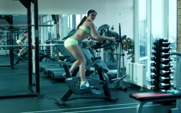 Stock Footage Woman With Headphones Training In The Treadmill Free