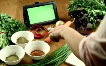 Stock Footage Women Watching A Recipe On A Tablet Device Free