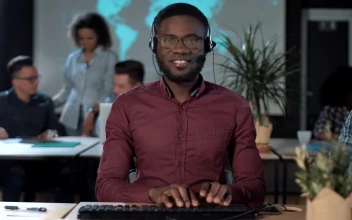 Stock Footage Worker In Front Of The Computer With Headset Free