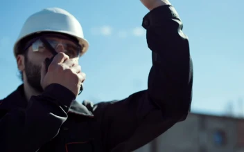 Stock Footage Worker Giving Instructions On The Radio Free
