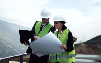 Stock Footage Workers Checking A Blueprint In The Solar Field Free