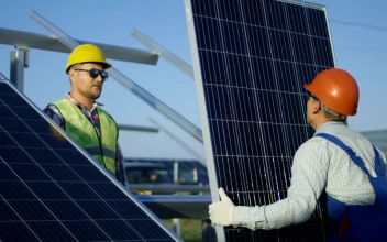 Stock Footage Workers Installing A Solar Panel Outdoors Free