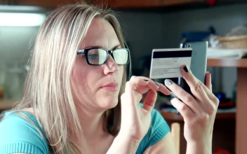 Stock Footage Young Woman Shopping Online With A Smartphone Free