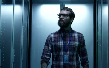 Stock Footage Young It Specialist Working On A Server Room Free