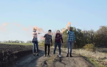 Stock Footage Young People With Smoke Grenades Outdoors Free