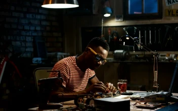 Stock Footage Young Man Repairing A Circuit On The Garage Free