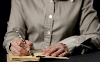 Stock Footage Writing In A Brown Notebook Free