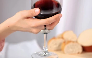 Stock Footage Woman Mixing Red Wine In A Glass Goblet Free
