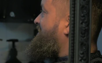 Stock Footage Woman Trimming A Long Beard Free