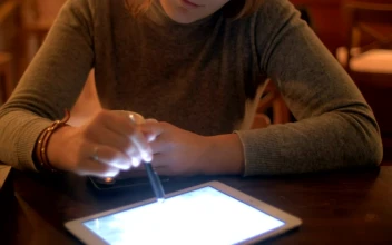 Stock Footage Woman Drinking Tea And Using A Tablet Free