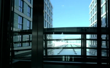 Stock Footage Woman Walking Out Of An Elevator Free
