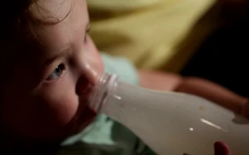 Stock Footage Young Child Drinking From A Bottle Free