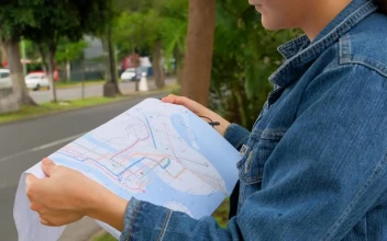 Stock Footage Woman On The Street Locating Herself With A Map Of Free