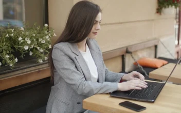Stock Footage Woman Working Remotely From A Coffee Shop Free