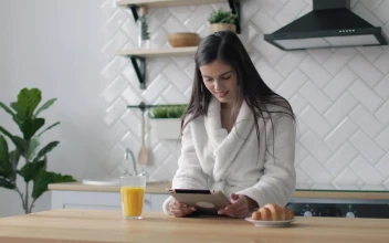 Stock Footage Woman Works On Her Tablet In The Morning Free