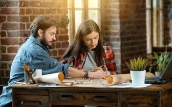 Stock Footage Work Team Planning A Project On Blueprints Free