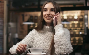 Stock Footage Woman Talking On The Phone In A Coffee Shop Free