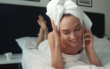 Stock Footage Woman Talking On The Phone After Taking A Shower Free